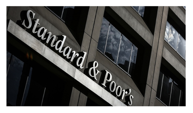 S&P küresel büyüme tahminini düşürdü